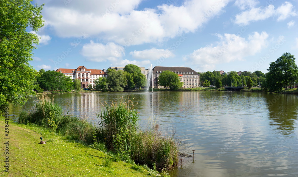 Fototapeta premium Panoramic view of the city hall against the lake, Kiel