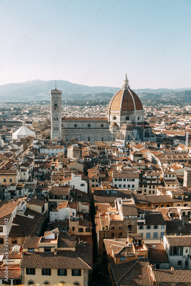 Panoramas and sights of the evening city. Santa Maria at sunset in Florence.
