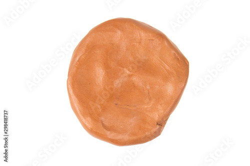 Brown plasticine isolated on white background.