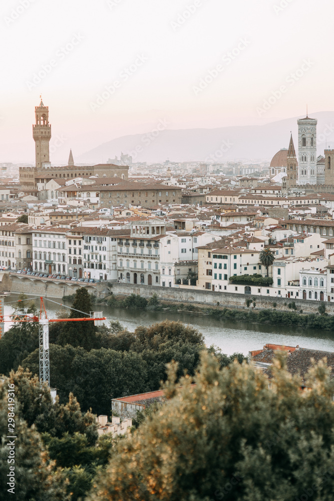 Panorama and sights of the old city. Sunset and evening in Florence.