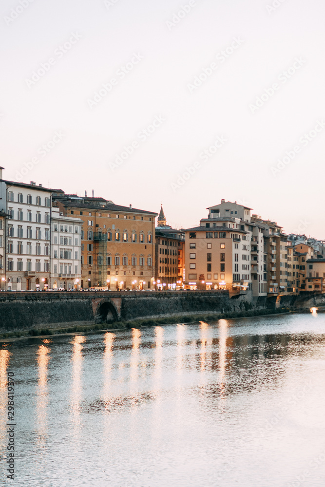 Panorama and sights of the old city. Sunset and evening in Florence.
