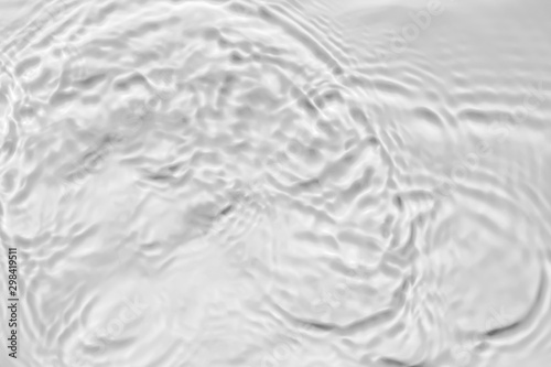 Water waves on the pool. Abstract background. Black and white concept.