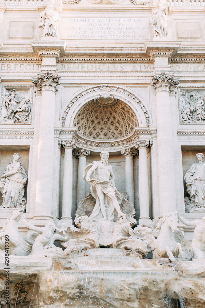 Panorama and sights of Rome. Trevi fountain at dawn.