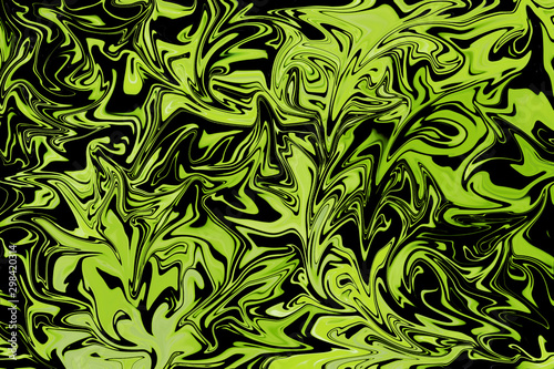 Background of green and black abstract shapes modified with liquify filter.Concept of decorating coatings, wallpaper, postcards.