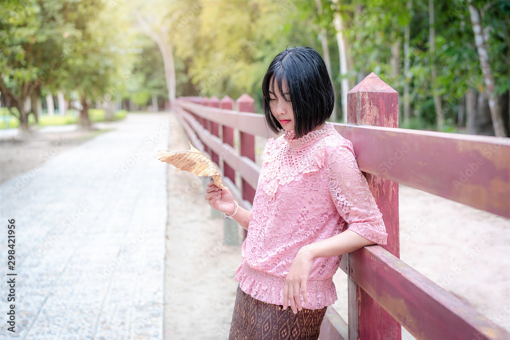Naklejka premium freedom, standing, white, cheerful, girl, beautiful, casual, lonely, attractive, natural, pretty woman, female, happy, beauty, model, asian woman, spring, smile, caucasian, face, fashion, lady, charmi