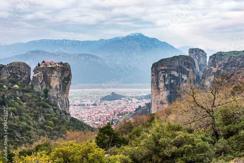 Landscape in Meteora with the monastery of Agia Triada and the town of Kalabaka