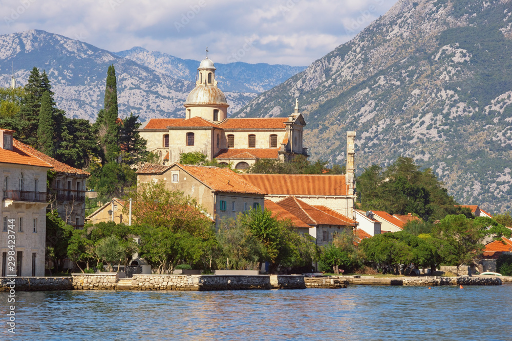 Montenegro. View of Prcanj town and Birth of Our Lady Church. Kotor Bay of Adriatic Sea