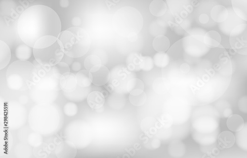 Bokeh on the gray background. Vector blur abstract texture with lot of bubble