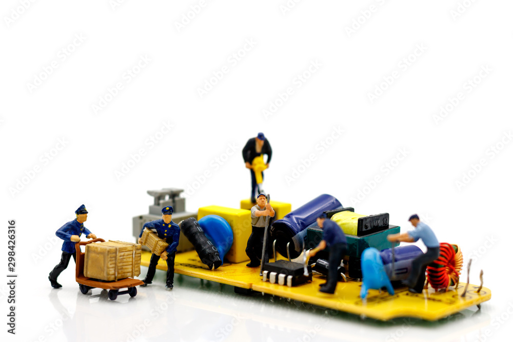 Miniature people: Engineers fixing error on chip of circuit board. Computer repair concept. Miniature people: Engineers fixing error on chip of circuit board. Computer repair concept.