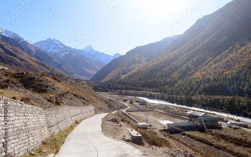 Landscape scenery of Chitkul Village, last village point in Sangla Valley, India on old Hindustan-Tibet trade route -NH 22 in Kinnaur district, Himachal Pradesh on banks of Baspa River Gangotri Valley photo