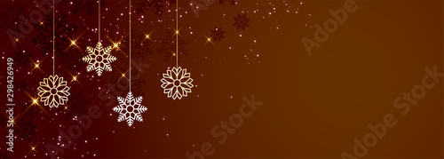 brown christmas snowflakes banner with text space
