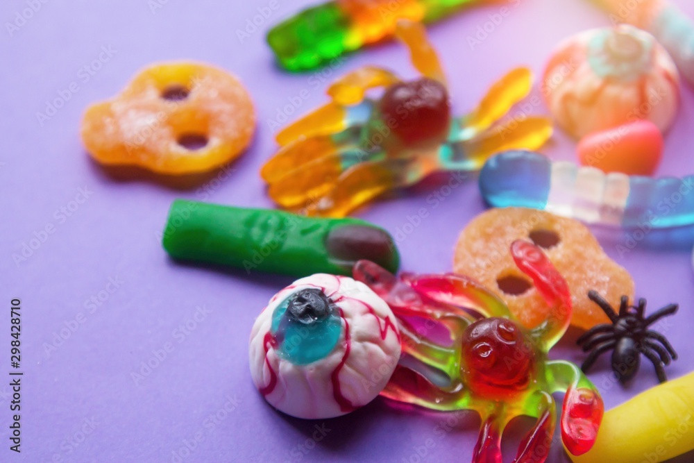 halloween candies seen close up on purple background halloween candies seen close up on purple background