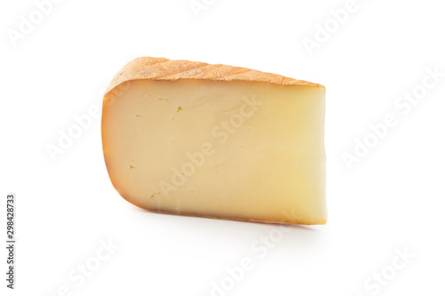 Piece of tasty fresh cheese isolated on white