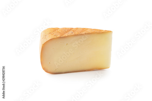 Piece of tasty fresh cheese isolated on white