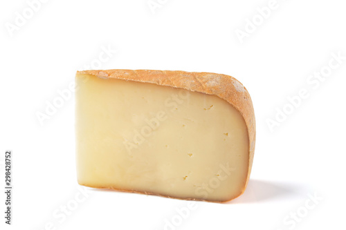 Piece of tasty fresh cheese isolated on white