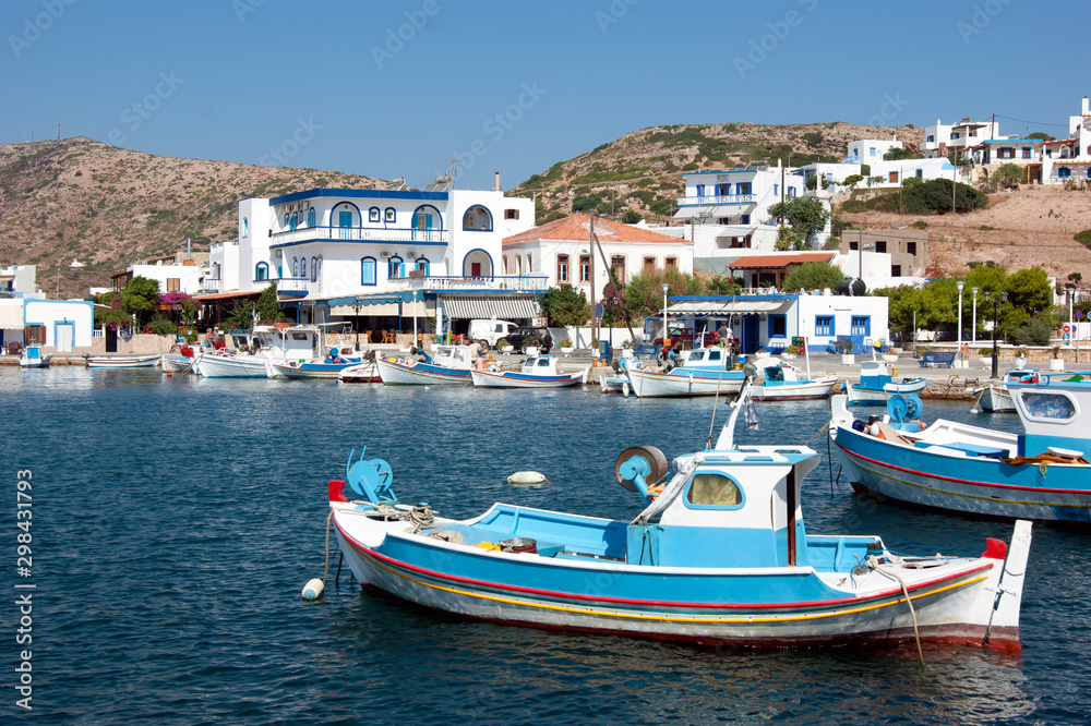 Greece – Lipsi island.  Small, traditional fishing boats at anchor in the harbor.