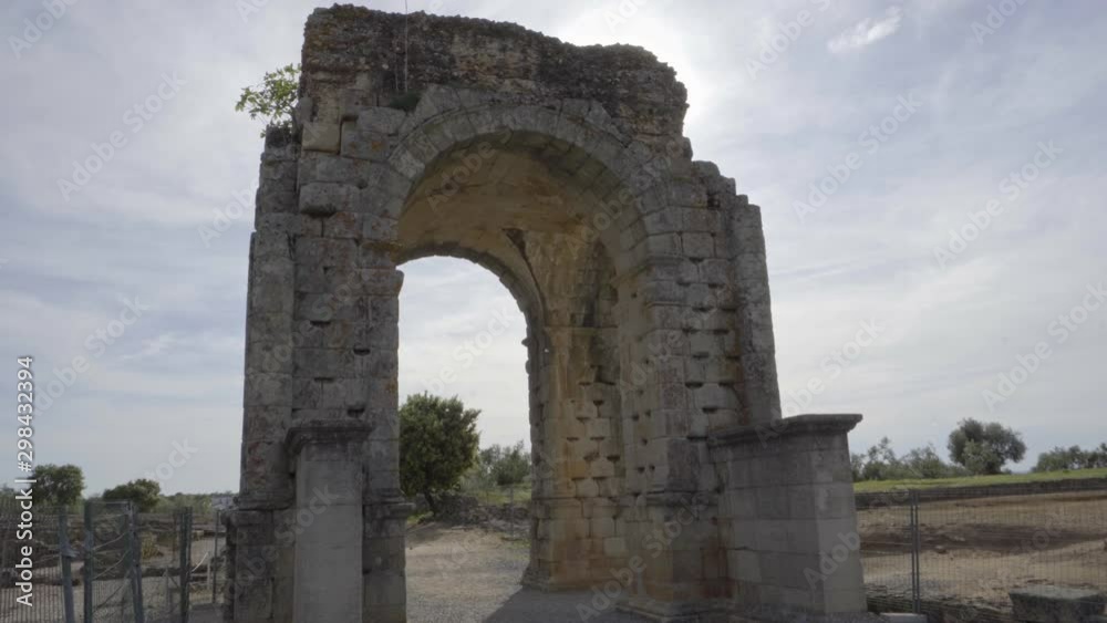 Arch of Caparra, famous tetrapylum in The Roman city of Caparra, now permanently abandoned. Founded near first century in the roman empire period and located in the north of Extremadura, Spain. Arch of Caparra, famous tetrapylum in The Roman city of Caparra, now permanently abandoned. Founded near first century in the roman empire period and located in the north of Extremadura, Spain.