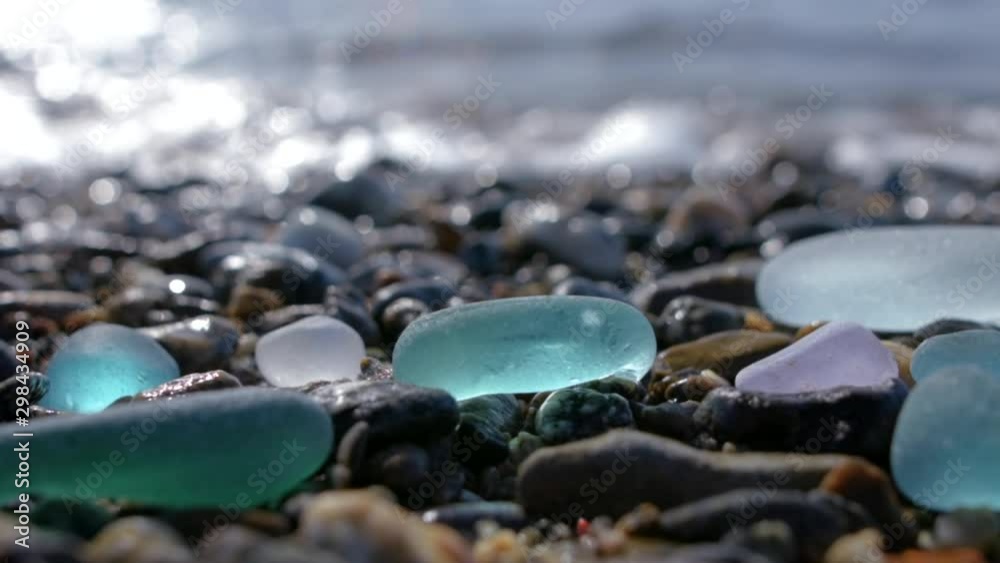 Glass pebbles on beach