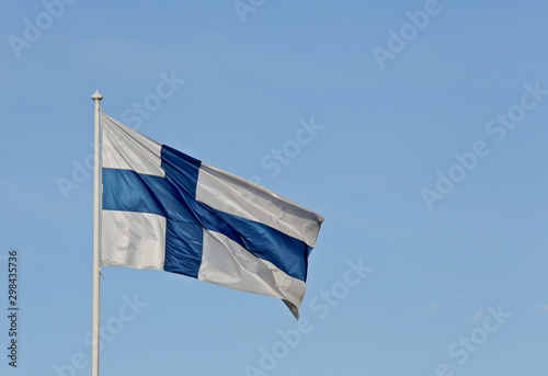Finnish blue white flag in the air
