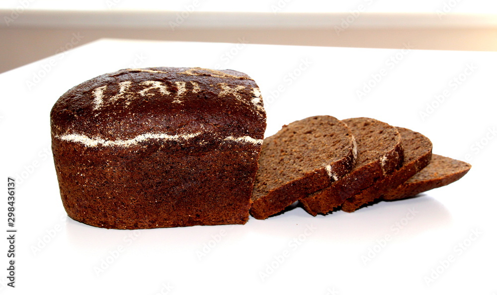 Black bread. Bakery products. Dough. Brown flour. Loaf of bread. Black bread. Bakery products. Dough. Brown flour. Loaf of bread.