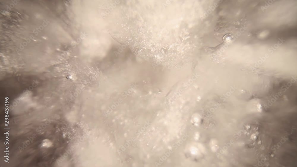 submerged in a blender filled with crushed ice cubes & water, pulling away from ice, many fine details in ice appear - using a wide angle probe lens, getting unique perspectives. submerged in a blender filled with crushed ice cubes & water, pulling away from ice, many fine details in ice appear - using a wide angle probe lens, getting unique perspectives.