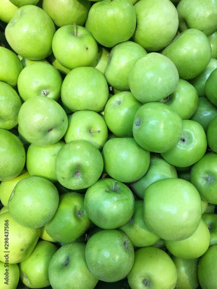 green apples on black background green apples on black background