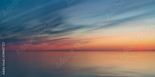 Long-exposure sunrise on the sea