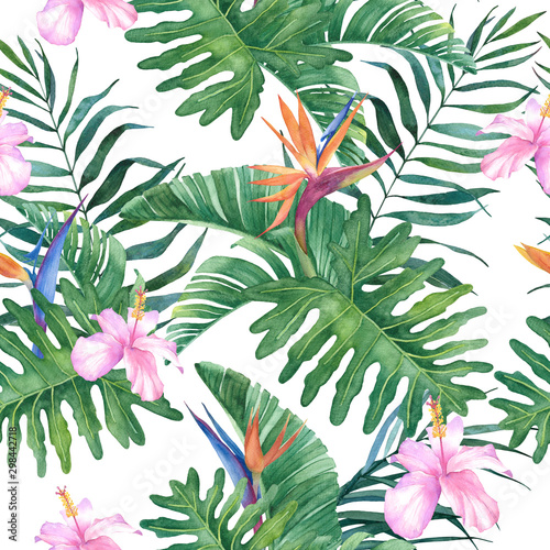 Tropical watercolor seamless pattern with exotic hibiscus and strelitzia flowers and leaves on a white background.