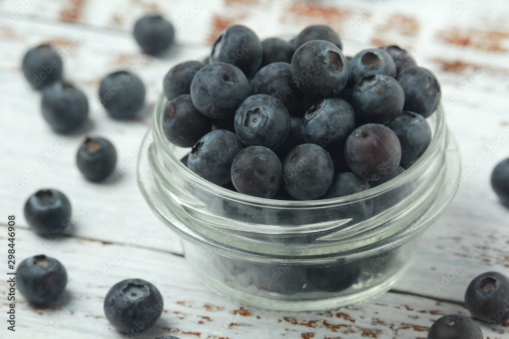 A glass bowl with blueberry	