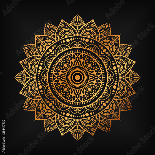 luxury ornamental mandala design background in gold color