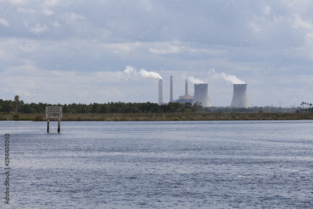Power plant cooling towers viewed over Florida wetlands Power plant cooling towers viewed over Florida wetlands