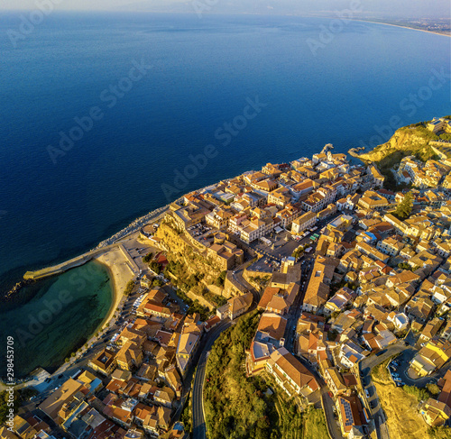 Aerial view of Pizzo Calabro, pier, castle, Calabria, tourism Italy. Panoramic view of the small town of Pizzo Calabro by the sea. Houses on the rock. On the cliff stands the Aragonese castle. Seafron