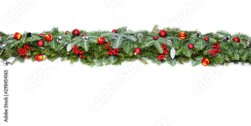 Christmas decorative background border with red bauble decorations and holly berries photo