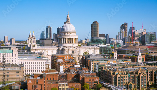 St. Paul's cathedral and City of London view including river Thames and Millennium bridge in early morning. © IRStone