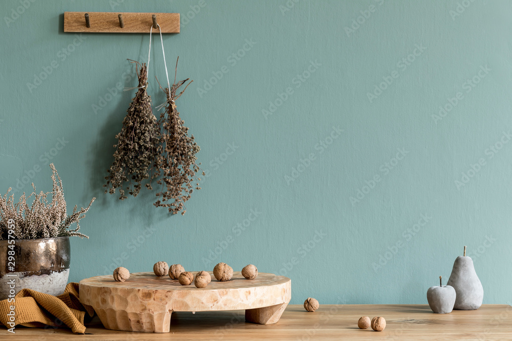 Interior design of dining room with wooden table, kitchen accessories, herbs , plants and elegant accessories. Eucaltyptus color concept. Template. Ready to use. Stylish scandinavian home decor. - obrazy, fototapety, plakaty 
