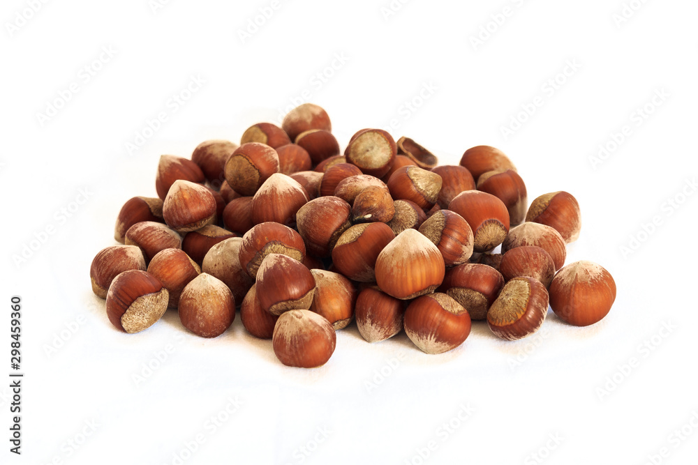 Shelled hazelnuts on isolated white background Shelled hazelnuts on isolated white background