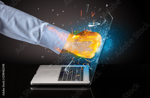 Firing hand hitting strongly laptop screen glass © ra2 studio