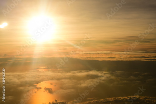  yellow sky and beautiful clouds. During the setting sun Viewed from a high angle on the plane © tharathip