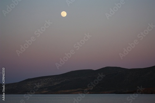 Full moon rising over Eastern Crete  Mediterranean sea