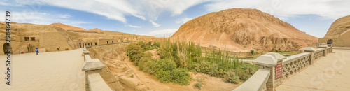 Turpan, China - composed by 77 rock-cut caves, each with the ceiling covered with Buddha murals, the Bezeklik Caves are among the main attractions of Turpan prefecture photo