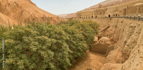 Turpan, China - composed by 77 rock-cut caves, each with the ceiling covered with Buddha murals, the Bezeklik Caves are among the main attractions of Turpan prefecture photo