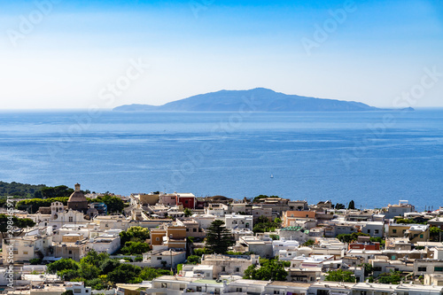 Panoramic view of Anacapri town, Ischia and other Phlegraean Islands from the chairlift rinding up to Monte Solaro, Capri, Campania, Italy photo