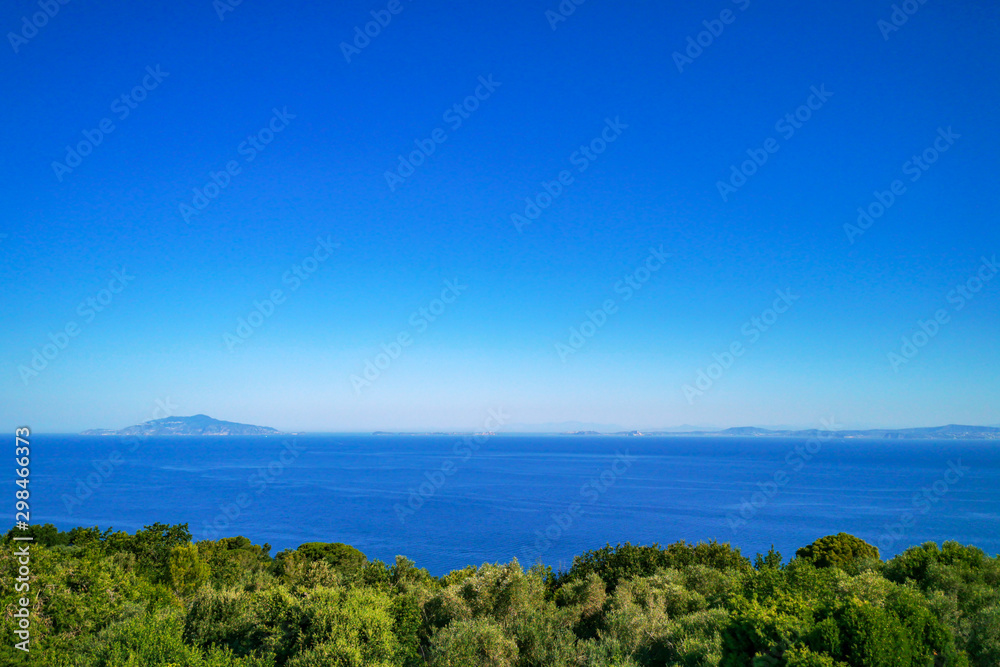 Seascape in a clear sunny day from Anacapri with a view on Gulf on Naples and Ischia island on the right, Campania, Italy Seascape in a clear sunny day from Anacapri with a view on Gulf on Naples and Ischia island on the right, Campania, Italy