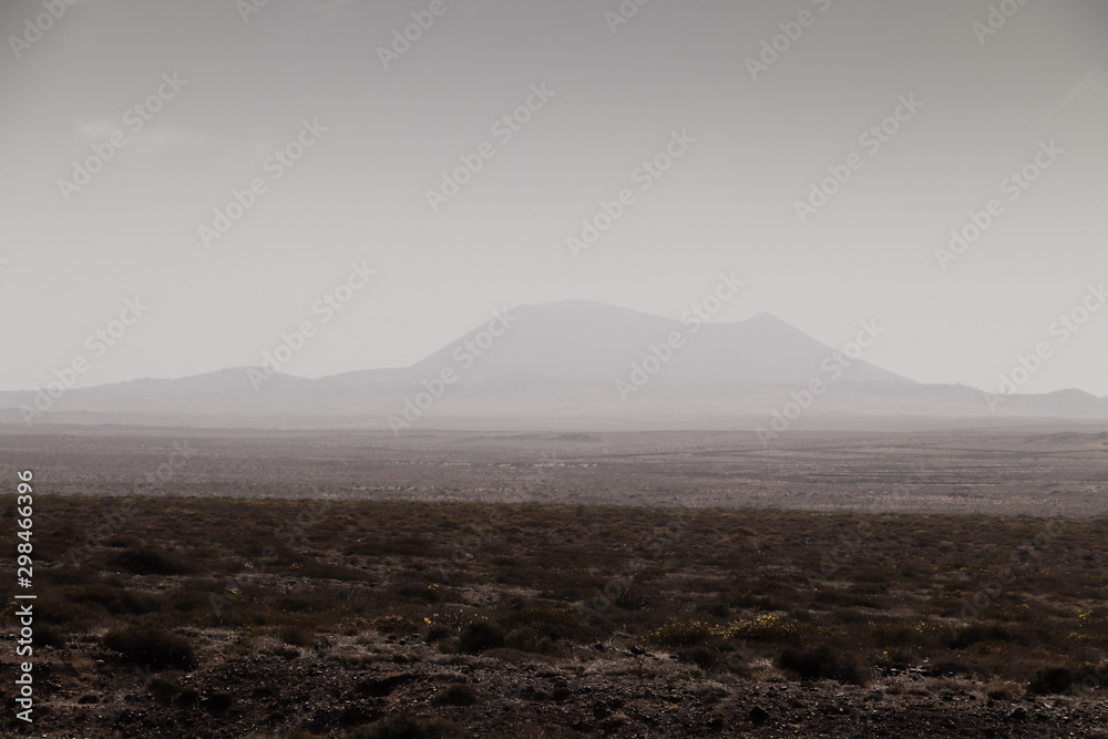 Misty desert on a background of mountains Misty desert on a background of mountains