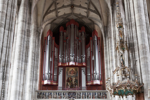 The interior of the Church of St. George in Dinkelsbuhl, ancient musical organ. Bavaria. Germany