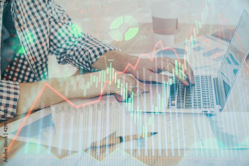 Multi exposure of stock market chart with man working on computer on background. Concept of financial analysis. Multi exposure of stock market chart with man working on computer on background. Concept of financial analysis.