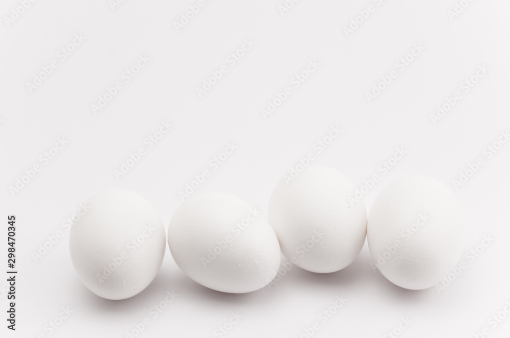 white eggs in a row - natural shapes backdrop white eggs in a row - natural shapes backdrop