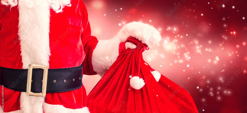 Santa holding a red sack on a shiny light background