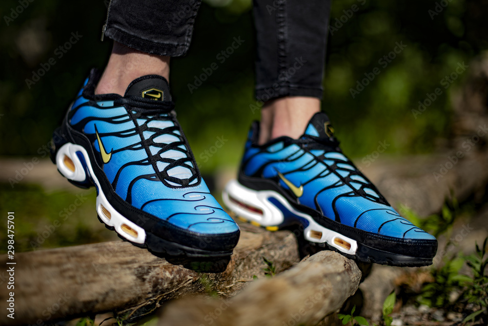 Young man wearing Nike Air Max TN Hyperblue shoes outside Stock Photo |  Adobe Stock