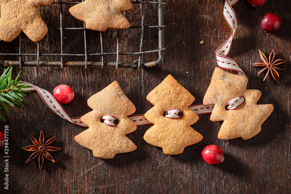 Cute chain made of gingerbread cookies as decoration for Christmas Cute chain made of gingerbread cookies as decoration for Christmas